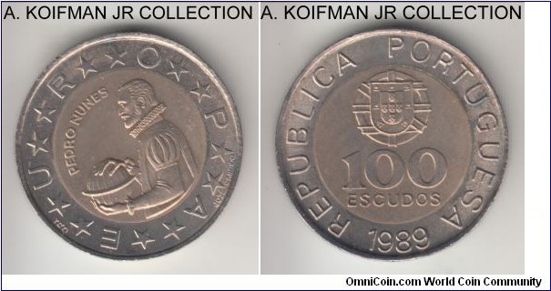 KM-645.1, 1989 Portugal 100 escudo; bi-metallic: aluminium-bronze centre in copper-nickel ring, segment reeded edge (6 segment variety); Pedro Nunes circulation issue, coin orientation, average uncirculated and lightly toned. 