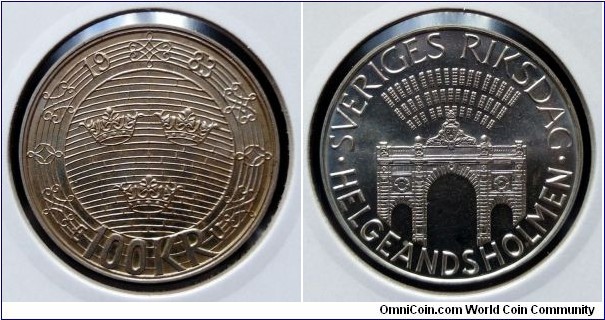 Sweden 100 kronor.
1983, Parliament Helgeandholmen. Ag 925. Weight; 16g. Diameter; 32mm. Mintage: 400.000 pcs.