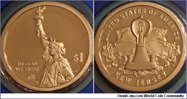 New Jersey American Innovation $1 Coin. Recognizing the invention of the light bulb. Manganese-brass, 26.5 mm