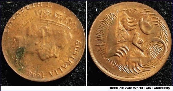 Australia 1994 5 cents overstruck over Singapore 1978 (?) 1 cent. Rotated to show the original host coin. Struck on copper plated steel. Weight: 1.75g
