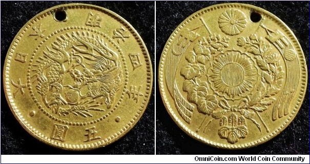 Japan 1871 5 yen. Unfortunate hole. Weight: 8.21g