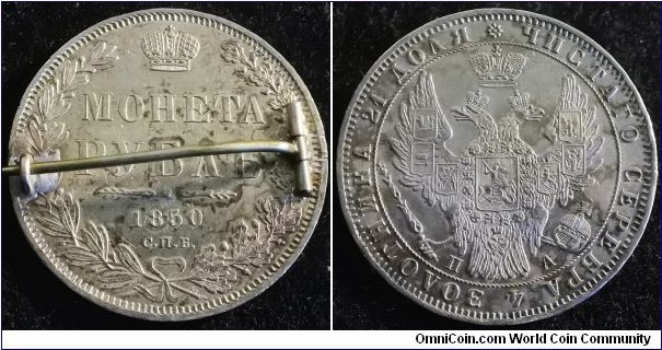 Russia 1850 1 ruble. Technically UNC however was made into a brooch. 