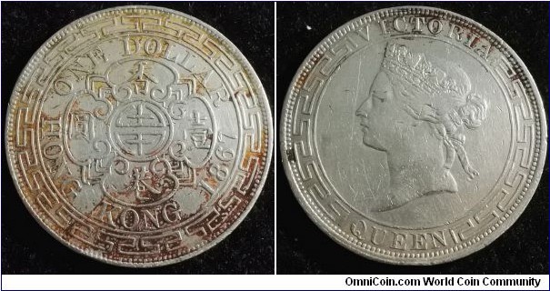 Hong Kong 1867 1 dollar. Pretty hard to find in any condition! Some stains. Weight: 26.89g