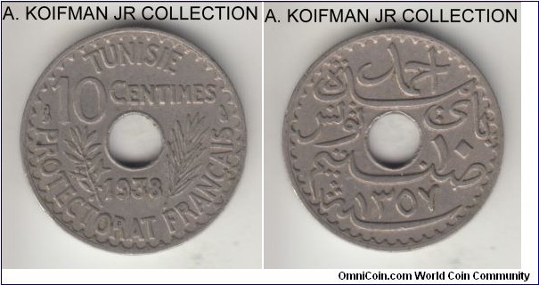 KM-259, AH1357-1938 Tunisia 10 centimes, Paris mint; nickel-brass, holed flan, plain edge; 4-year type, good very fine.