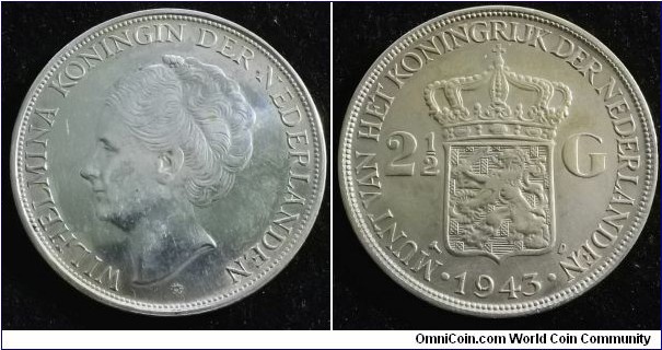 Netherlands East Indies 1943 2 1/2 gulden. Nice condition! Mintage: 2,000,000. Weight: 24.98g