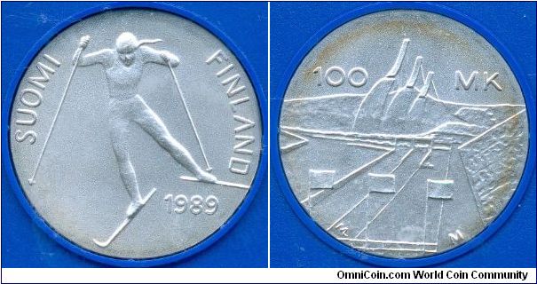 100 markkaa commemorating the World Ski Championships in Lahti. Designed by Marjo Lahtinen.