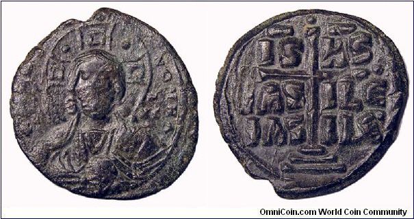 Byzantine Empire AE Follis 1030-1042 AD.
Obv: Bust of Christ.
Rev: Inscription in Cross - IS XS BASILE BASILE.
Placed this in Mid-East, Unknown - No option for Byzantine Empire.