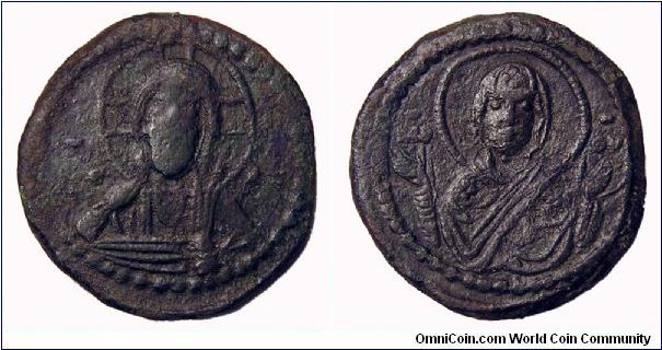 Byzantine Empire AE Follis 1065-1070 AD.
Obv: Bust of Christ.
Rev: Bust of Mary.
Placed this in Mid-East, Unknown - No option for Byzantine Empire.