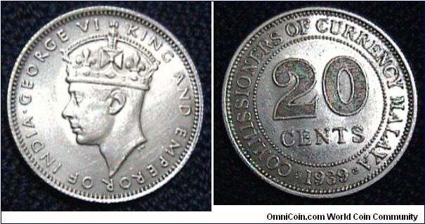STRAITS SETTLEMENT  1939 20 CENTS SILVER COIN. IT IS ALMOST UNC CONDITION. DEFIINITELY MADE FROM PURE SILVER. FOR SALE. PLEASE MAKE AN OFFER.