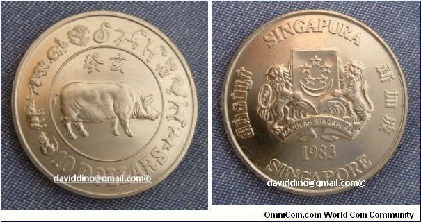 SINGAPORE 1983  $10 YEAR OF PIG PROOF.
(SOLD TO MR KEVIN QUELCH OF BRISBANE, AUSTRALIA ON 29/4/2005. Few more available)
Uncirculated showpiece proof. The Pig in Chinese mythology & horoscope is a symbol of wealth, success, & abundance. People born in years of Pig are usually known to lead good,  happy & easy lives.
For sale. Please make an offer.