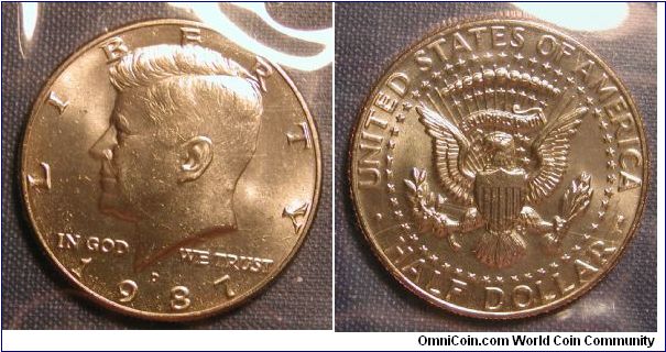 1987-D Kenndey Half Dollar from Uncirculated Mint Set in original packaging.