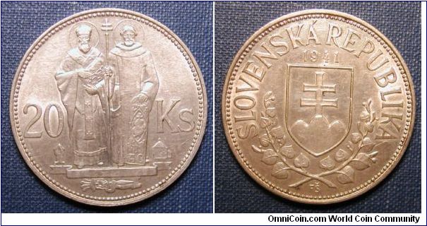 1941 Slovakia 20 Korun TYPE 1  .WEIGHT 15 g( .500 SILVER), DIAMETER 32 mm. REEDED EDGE.O.S. ST. KYRILL AND MEFODIUS. R.S. SLOVAK SHIELD, DATE ABOVE, LINDEN SPRIGS BELOW.