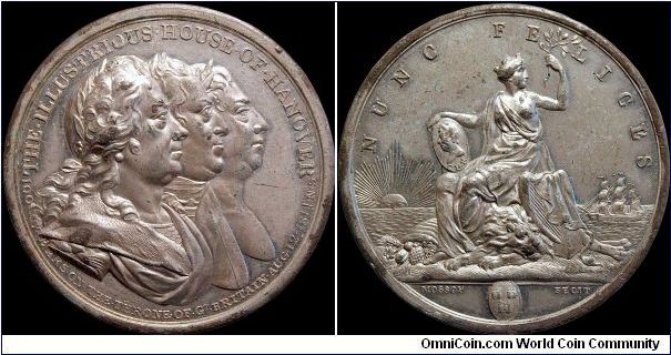 Centenary of the Accession of the House of Brunswick.

The three Georges on the obverse. On the reverse is Peace (this was the time of Napoleon's first abdication) holding a medallion with the Prince Regent on it. (Great Britain)                                                                                                                                                                                                                                                                             