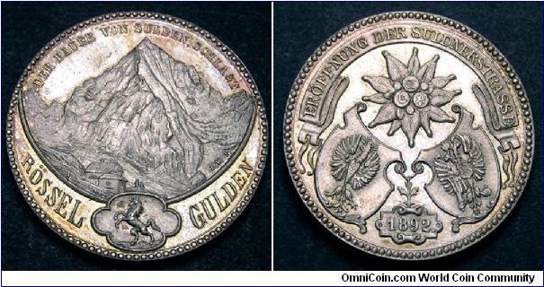 1892 Switzerland AR32 Medal. Obv: View of Alps above the Arms of Chur Ingraubunden. Rev: Arms of Germany & Austria. The medal commemorates the opening of the Suldner Road in the Alps.