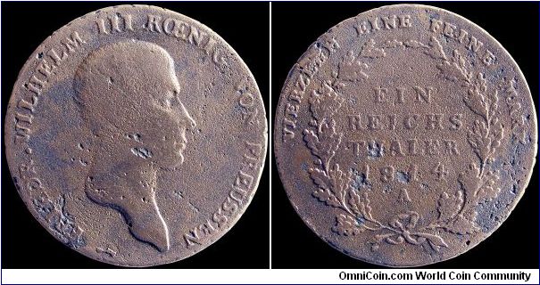 1 Thaler, Prussia.

A dollar sized coin with the usual porosity and heavy wear.                                                                                                                                                                                                                                                                                                                                                                                                                                   