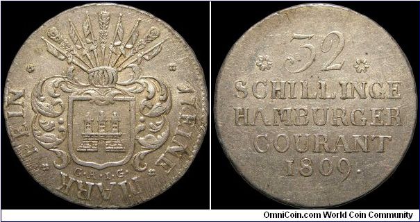 32 Shilling, Hamburg.

Adjustment marks. C. A. I. G. 
(C. A. J. Ginquembre, French director of the mint)                                                                                                                                                                                                                                                                                                                                                                                                         
