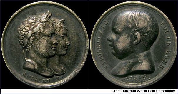 Birth of the King of Rome, France.

Sometimes known as Napoleon II, this is  14 mm in size.                                                                                                                                                                                                                                                                                                                                                                                                                       