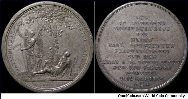 This is a personal medal commemorating 50 years of marriage. The obverse says something about a husband's love defying time. Forrer mentions this medal in his supplement on the engraver Johann Jakob Neuss. He dates it as 1805, silver and 34mm.                                                                                                                                                                                                                                                                 