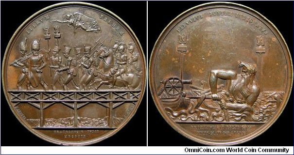 Bataille d'Essling et Passage du Danube, France.

Laskey says of this medal 'This medal alludes to the destruction of the bridges on the Danube, at the battle of Essling. The Archduke had intended to make a grand effort for the preservation of Vienna, by suddenly crossing the Danube, and hazarding a battle in front of the capital; but the rapid operations of Napoleon having frustrated his design, he took a position near the left bank of the river'.                                              