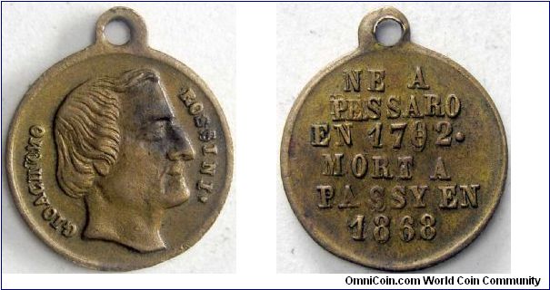 G. Rossini, Italy.

A death medal, about 14mm, issued about the time of the composer's death. The reverse is severely doubled.                                                                                                                                                                                                                                                                                                                                                                                    