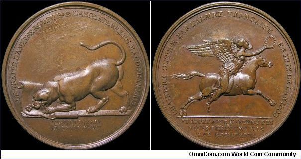 Conquete du Hanovre, France.

Loaded with political overtones, the obverse is supposed to be an English bulldog, tearing up the Treaty of Amiens. There is a deliberate die break under the French word rompu (or break) that distinguishes an original strike. On the reverse is Victory riding a Hanoveran horse, and proclaims that it was made of silver (obviously not for a copper example) from the mines of Hanover.  Hanover was ruled by George III at this time.                                       