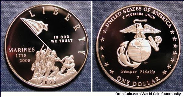 2005 Marine Corps 230th Anniversary Silver Dollar Proof

Mintage (max.): 600,000
Based on independent market research provided by the recipient organization (the Marine Corps Heritage Foundation), the Secretary exercised his authority (for the first time) to increase the legislated maximum mintage (500,000) to 600,000.
U.S. Mint Facility: Philadelphia
Public Law: 108-291

Obverse
Engraver: Norman E. Nemeth
Description: Historic flag raising on Iwo Jima, Inscriptions: Marines, 1775, 2005