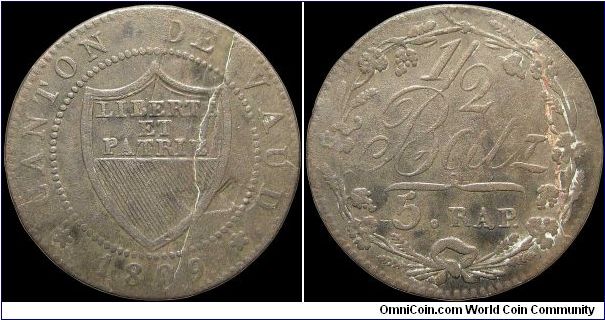 ½ Batzen, Canton of Vaud.

A strong planchet break shows through the entire coin, along with a tiny remnant of its original silvering.                                                                                                                                                                                                                                                                                                                                                                            