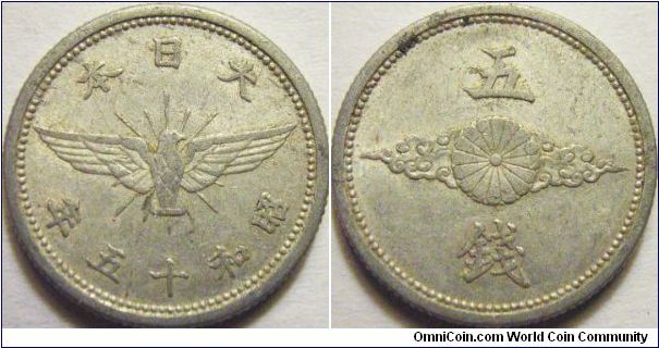 Japan 1940 (Showa 15) 5 sen. Features an Eagle on the obverse... Pretty plain and simple.