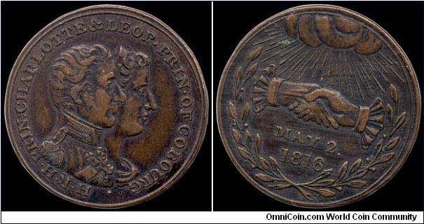 Marriage of Princess Charlotte and Prince Leopold of Saxe-Coburg, Great Britain.

This actually appears to be a variant of BHM 909. The heads are facing the wrong way on the obverse and there are minor differences in the legend. The reverse appears to be the same.                                                                                                                                                                                                                                          