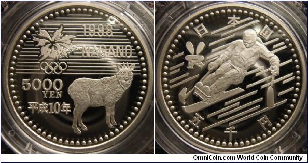 Japan 1998 Nagano Olympics Third Series 5000 yen. Featuring a Serow Deer and Paraolympics alpine skiing.

Mass of this coin is 15grams and is minted in 92.5% Ag and 7.5% Cu.
