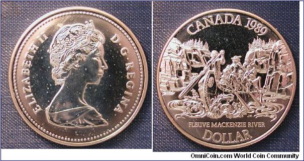 1989 Canada Silver Dollar, McKensie River Bicentennial.  Mintage 110,650, .500 Silver 23.3g, 36mm, Reeded edge. This one has the pox, ugly spotty toning.