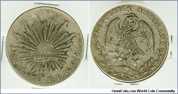 MEXICO 1876 GO/FR SILVER 8 REALES CAP N' RAYS. THIS COIN WAS CIRCULATED IN THE PHILIPPINES DURING THE SPANISH OCCUPATION.