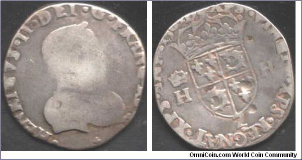 Another silver teston issued during the first year of reign of Charles IX.  This one is referred to as `teston du Dauphine as the reverse bears the arms of France and Dauphine). During this year money continued to be struck bearing the effigy of Henri II. This one was minted at Grenoble (Z mm under the shield). portraits did not wear well on this type coin (my excuse and i'm sticking to it!).