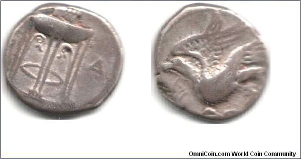 Silver Stater from the Greek City State of Kroton in Bruttium (foot of Italy) circa 420 - 390 BC. Obverse tripod / reverse eagle in flight