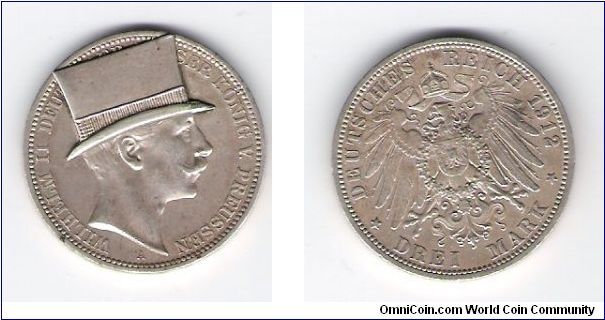 1912A SImilar to Km#527 German states PRUSSIA 
this was done to basically insult Willhem
basically thrown out as emporer
that hat is referred to as a cylinder and was post mint
http://www.muenzauktion.com/olding/item.php5?id=60424039

http://www.muenzauktion.com/gaebler/item.php5?id=440