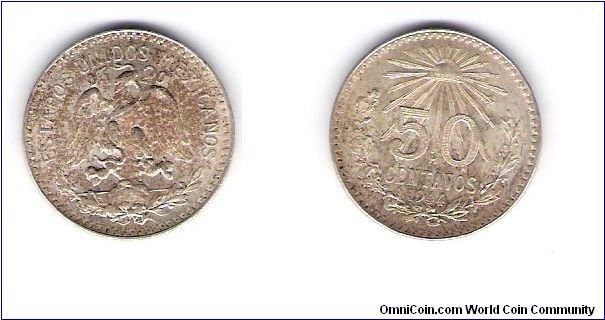 toned unc silver 50 centavos