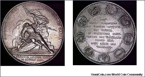 Smaller (38mm) shooting medal by Bovy minted in silver for the federal shooting festival at Basel in 1844. Only 2,500 minted in silver.