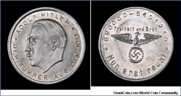 Germany, 1932 NSDAP election token. Aluminum
Obv: Hitler left. Leader out of hardship.
Rev: Eagle with swastika. Vote counts from earliest election to 1932 victory. Freedom and Bread. Now more than ever.