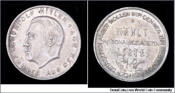 NSDAP Election token, Reichstag elections, 1928. Aluminum
Obv: Hitler left. The leader out of the hardship.
Rev: Vote National Socialist List 12. We want to pave the road to freedom for the German worker.