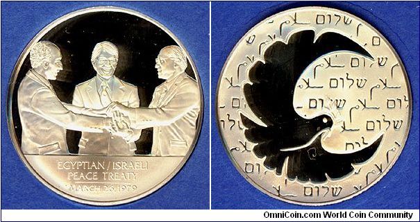 Egypt-Israel Peace Treaty Eyewitness Medal - Silver Proof, Franklin mint. Anwar Sadat, Jimmy Carter and Menachem Begin
at Signing of Egypt-Israel Peace Agreement, March 26, 1979