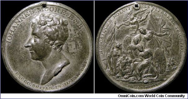 Death of Sir John Moore, Great Britain.

A rare white metal medal holed apparently by a square nail.                                                                                                                                                                                                                                                                                                                                                                                                              