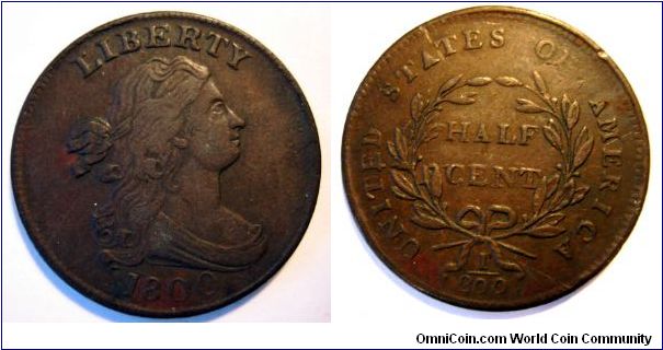 Draped Bust half cent. Actual color is a deep chocolate brown.