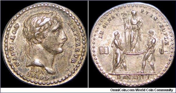 Le couronnement, France.

This 14mm medal is one of the most common of the Napoleonic era.                                                                                                                                                                                                                                                                                                                                                                                                                        