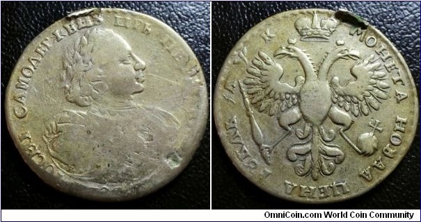 Russia 1720 1 ruble, mintmaster K. Worn as a medal, ex-jewellery. Would have been a weak VF but due to the wear on the obverse, it's a F-. Die rotation error! Weight: 26.80g