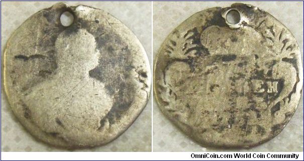 Russia 1753 (?) grivennik. Might be 1752. Terribly worn and holed but it was cheap.