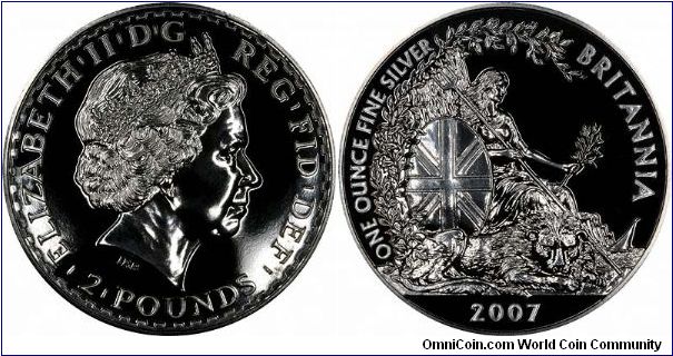 Not black coins, just difficult to photograph, even with a considerable amount of time and effort with different lighting. The new UK silver Britannia, normal uncirculated (bullion) version.