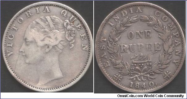 1840. Type 1 Indian Head Victoria rupee . British East India Company during colonial era. Calcutta mint, dot after date, 35 berries. Not quite VF and has an old scratch that looks like a hair (obverse).