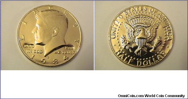 US Kennedy half Dollar that has been gold plated and counter stamped 1963-1983

1984-P