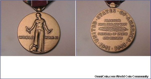 US WWII Victory Medal
UNITED STATES OF AMERICA 1941-1945
FREEDOM FROM FEAR AND WANT FREEDOM OF SPEECH AND RELIGION
bronze,with ribbon attached.