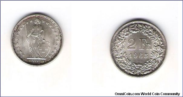 1965(B) 2 Franc
.835  silver            .2685 OZ
8.525 minted
KM#21
Light toning orond the perimeter with high luster through out